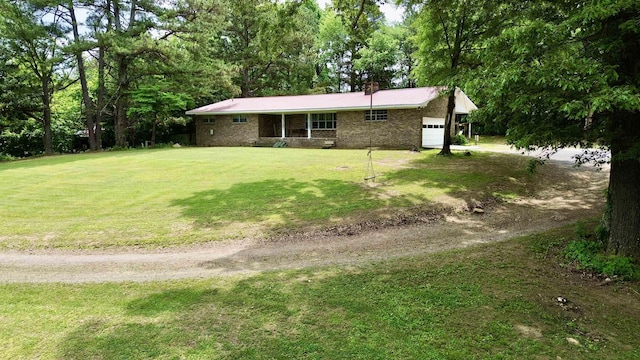 view of yard featuring a garage