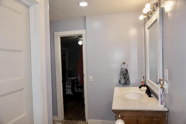 bathroom with vanity and ceiling fan