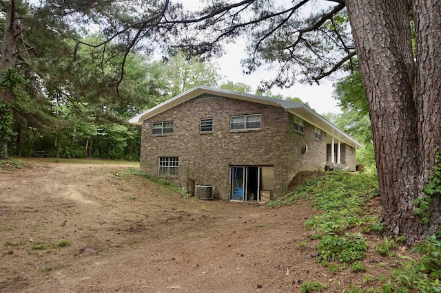 view of property exterior with central air condition unit