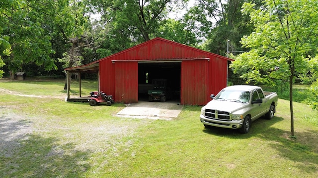 view of outdoor structure with a yard