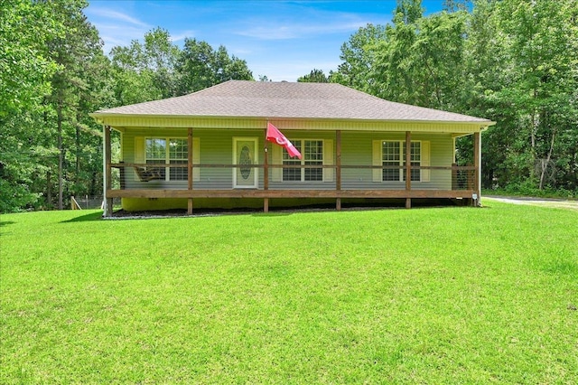  - country-style home with a front yard and roof with shingles