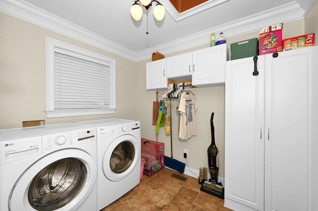 washroom with crown molding, cabinets, and independent washer and dryer