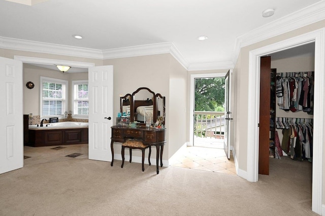 hallway featuring crown molding and light carpet