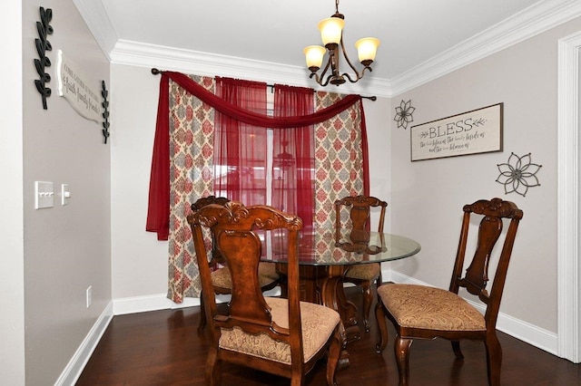 dining space with a chandelier, dark hardwood / wood-style flooring, and ornamental molding