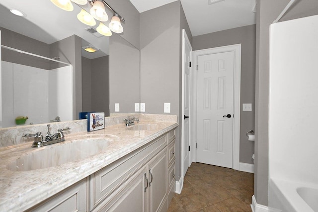 bathroom featuring vanity and tile patterned floors