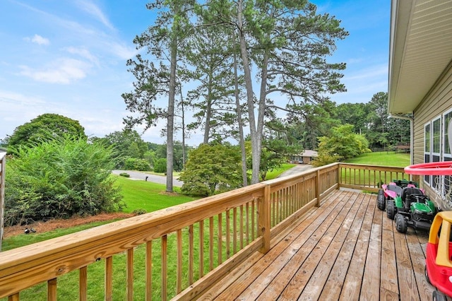 deck featuring a lawn