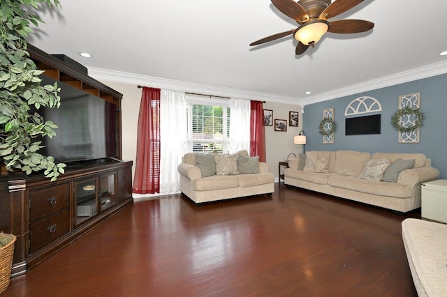 living room with ceiling fan, crown molding, and dark wood-type flooring