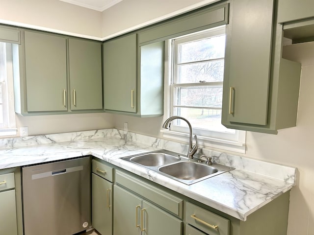 kitchen with a sink, green cabinetry, and stainless steel dishwasher