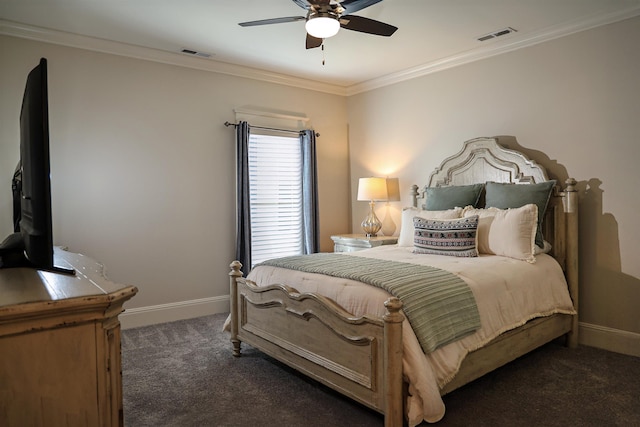 bedroom with dark colored carpet, ceiling fan, and crown molding