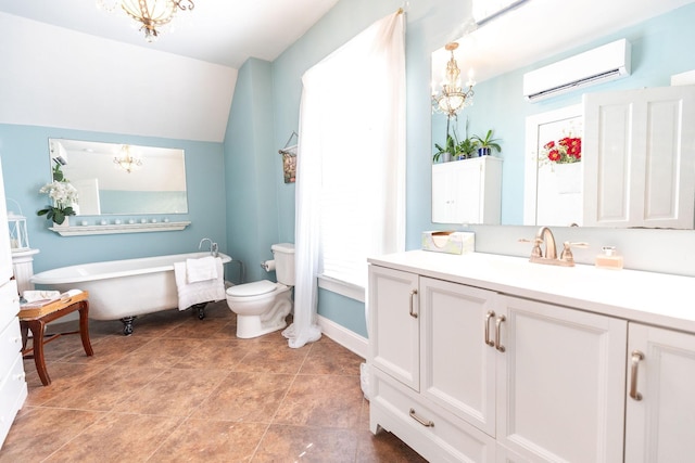 bathroom featuring vanity, vaulted ceiling, a wall unit AC, toilet, and a tub