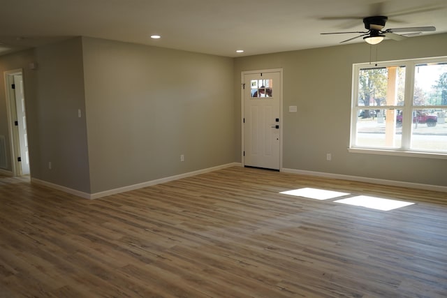 interior space featuring ceiling fan and hardwood / wood-style flooring