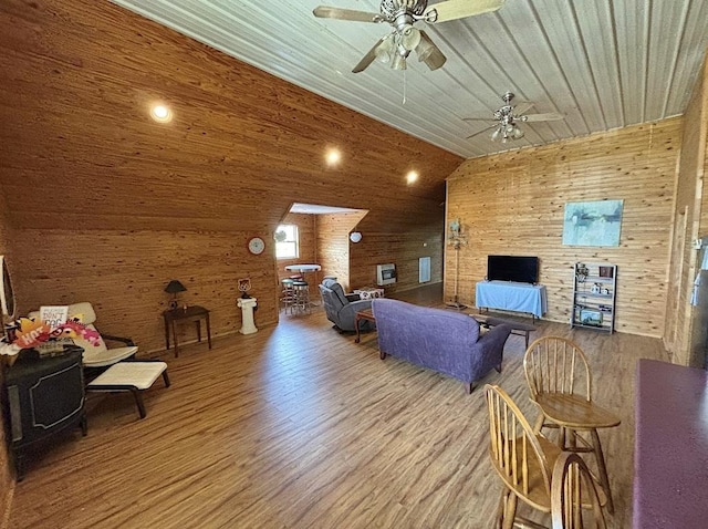  - living area featuring wood finished floors, ceiling fan, vaulted ceiling, and wood ceiling