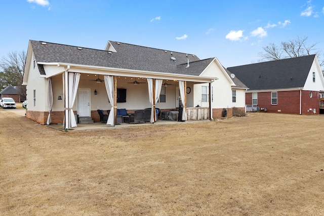 back of house with crawl space, roof with shingles, a patio, and ceiling fan