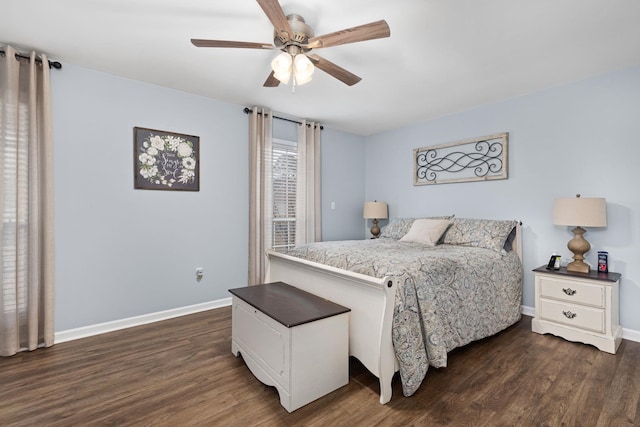 bedroom featuring ceiling fan, baseboards, and dark wood finished floors