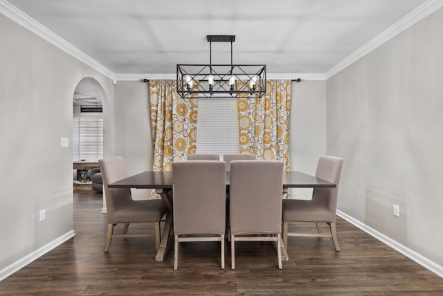 dining space with an inviting chandelier, arched walkways, dark wood-style flooring, and crown molding