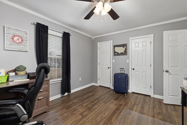 office space featuring crown molding, baseboards, ceiling fan, and wood finished floors