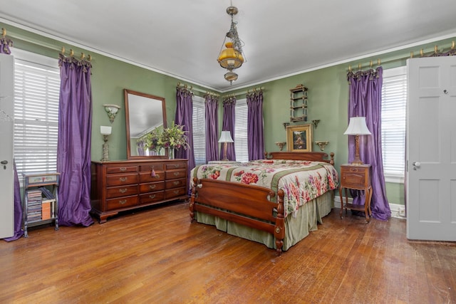 bedroom with wood-type flooring