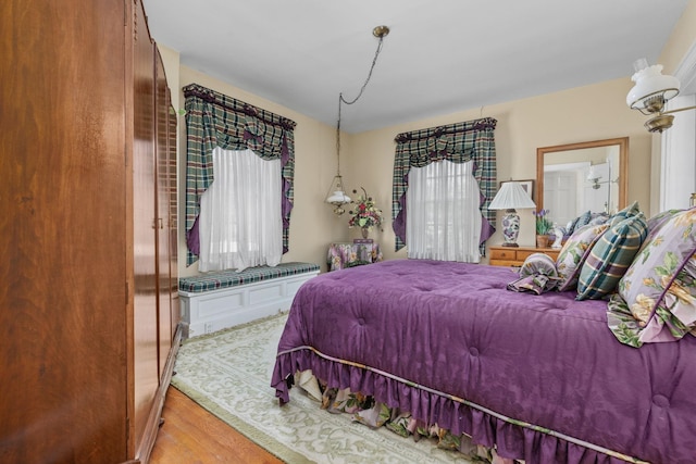 bedroom featuring light wood-type flooring