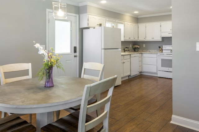  - kitchen featuring crown molding, white appliances, under cabinet range hood, white cabinetry, and dark wood-style floors