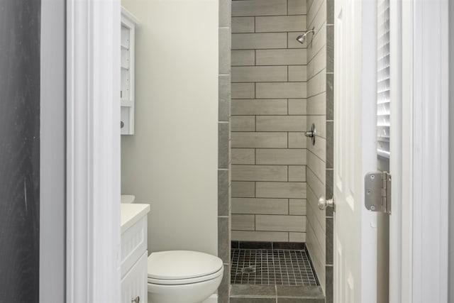  - bathroom with toilet, a stall shower, and vanity