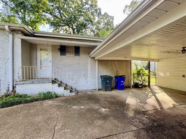  - doorway to property with brick siding