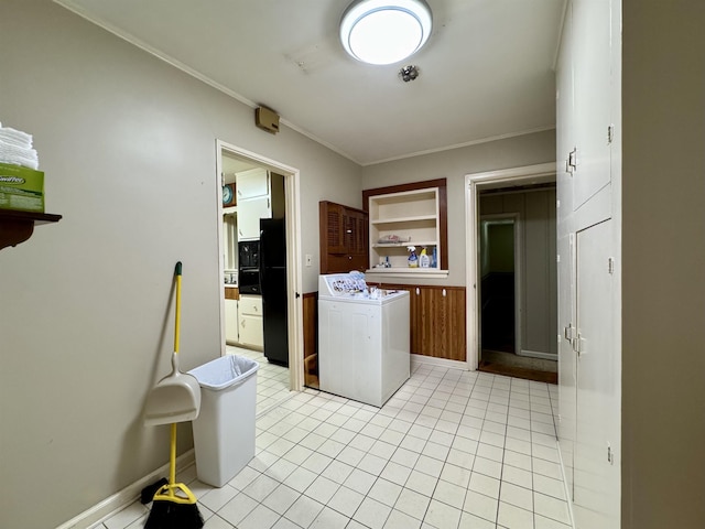  - washroom featuring washer / clothes dryer, crown molding, and light tile patterned flooring