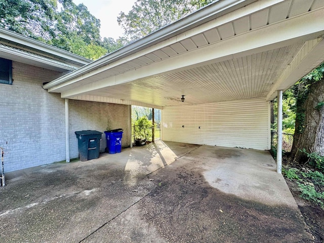  - view of patio featuring a carport