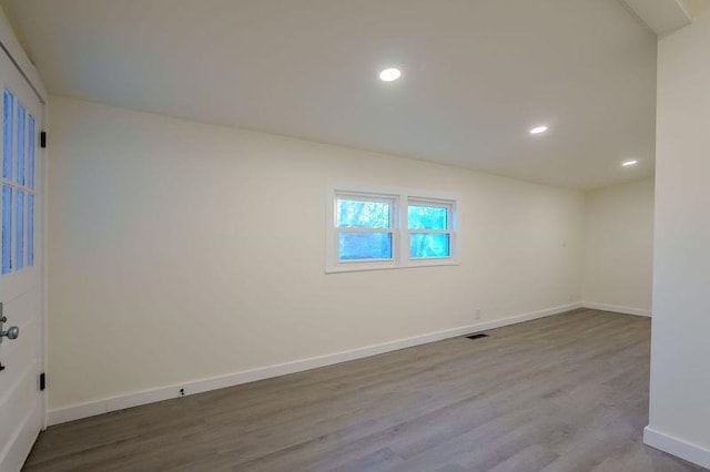  - spare room with wood finished floors and recessed lighting