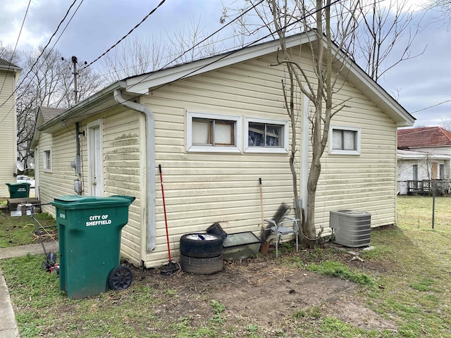 view of side of property featuring central AC unit