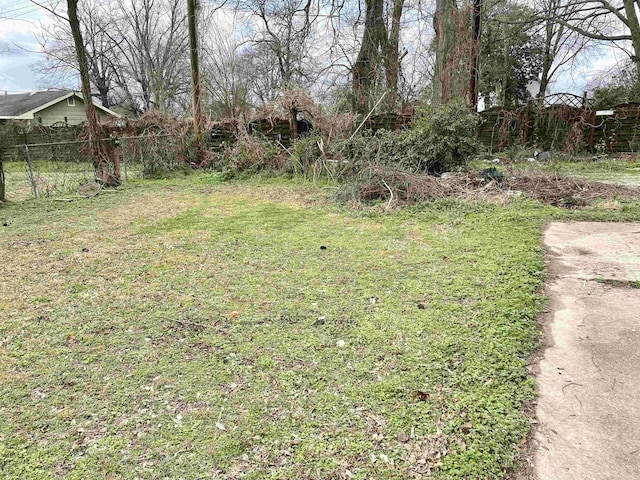 view of yard with fence