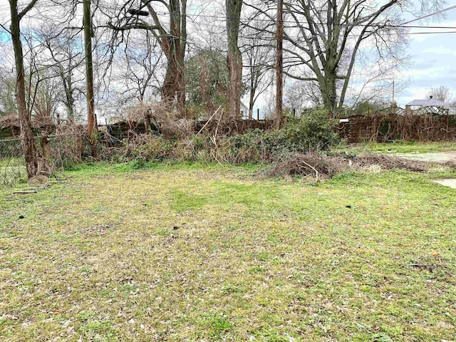 view of yard with fence