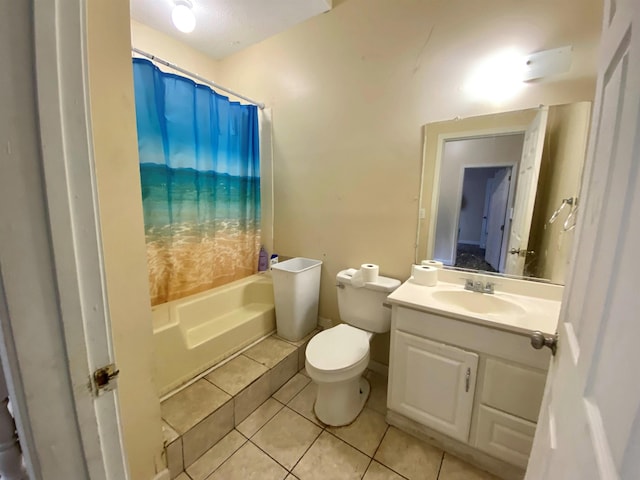 bathroom featuring tile patterned floors, toilet, and vanity