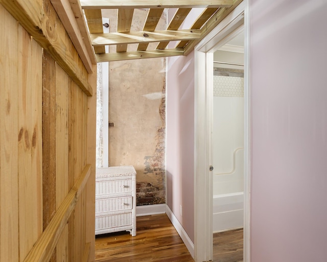  - walk in closet featuring wood finished floors