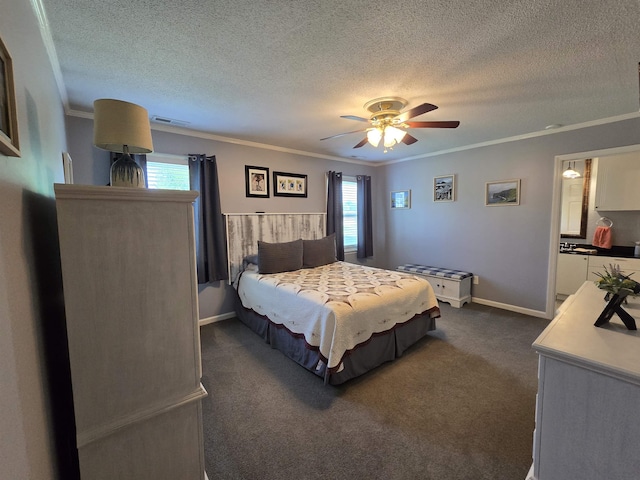  - bedroom featuring crown molding, dark carpet, a textured ceiling, and ceiling fan