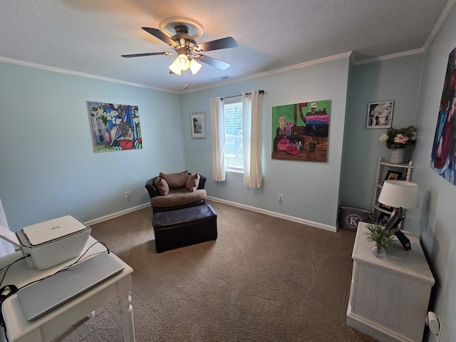  - living area with a ceiling fan, a textured ceiling, dark carpet, and ornamental molding