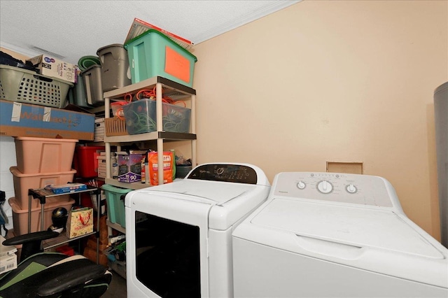 laundry room featuring washer and clothes dryer