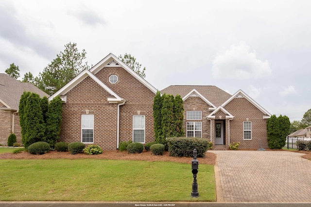 view of front of property with a front lawn