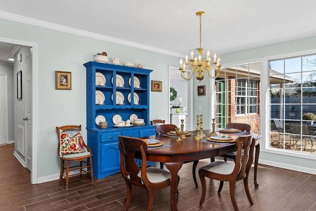 dining room featuring an inviting chandelier and ornamental molding