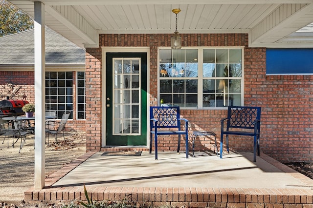 doorway to property featuring a patio