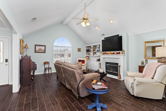 living room featuring vaulted ceiling with beams and ceiling fan