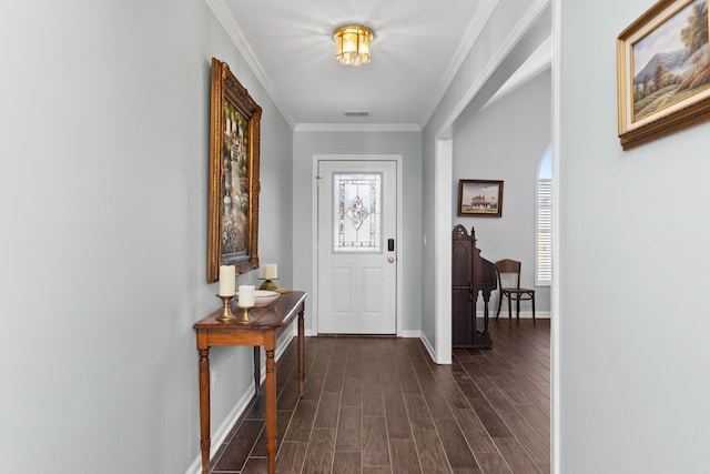 entryway with dark hardwood / wood-style flooring and crown molding