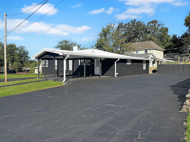 view of front of house with a carport