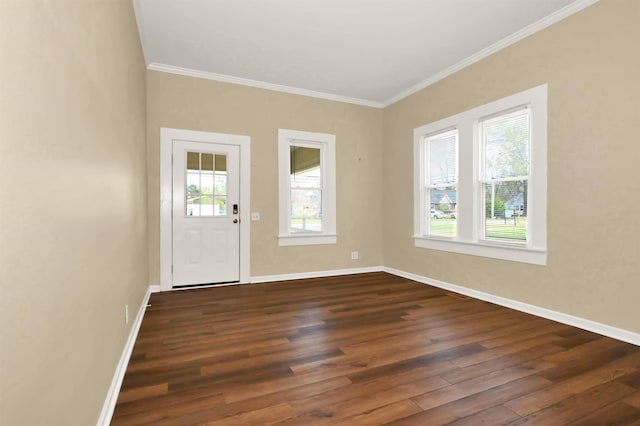 entryway with baseboards, crown molding, and dark wood-type flooring