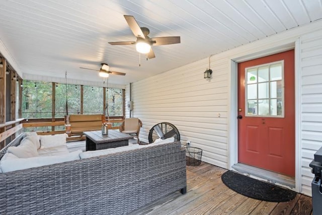 exterior space with outdoor lounge area and ceiling fan