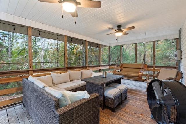 sunroom / solarium with ceiling fan