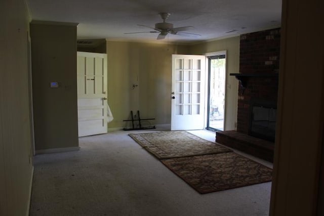 interior space featuring a fireplace, light colored carpet, ceiling fan, and ornamental molding