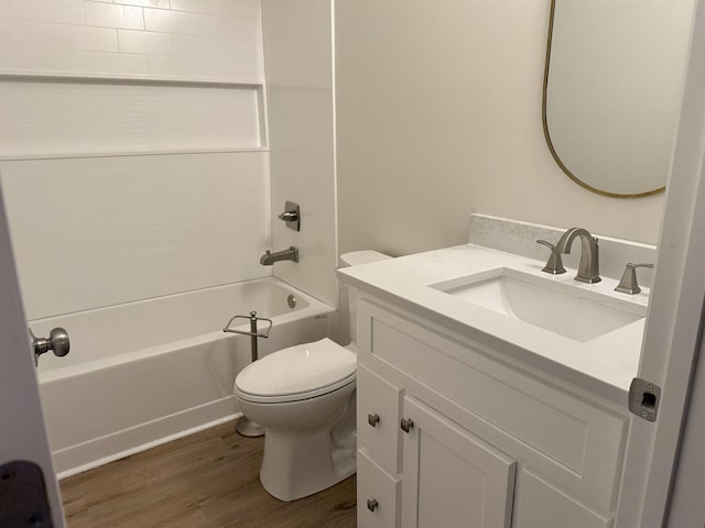 full bathroom featuring vanity, toilet, shower / washtub combination, and wood-type flooring