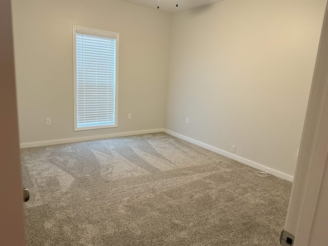 empty room with carpet flooring