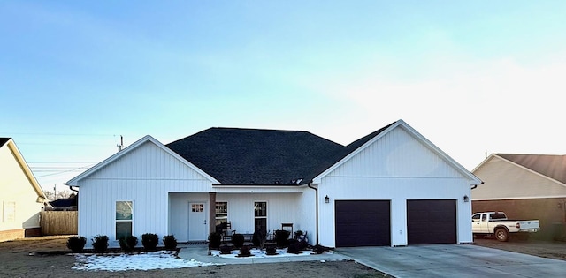 modern farmhouse featuring a garage