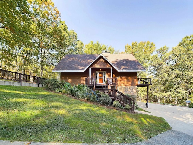 view of front of home with a front yard